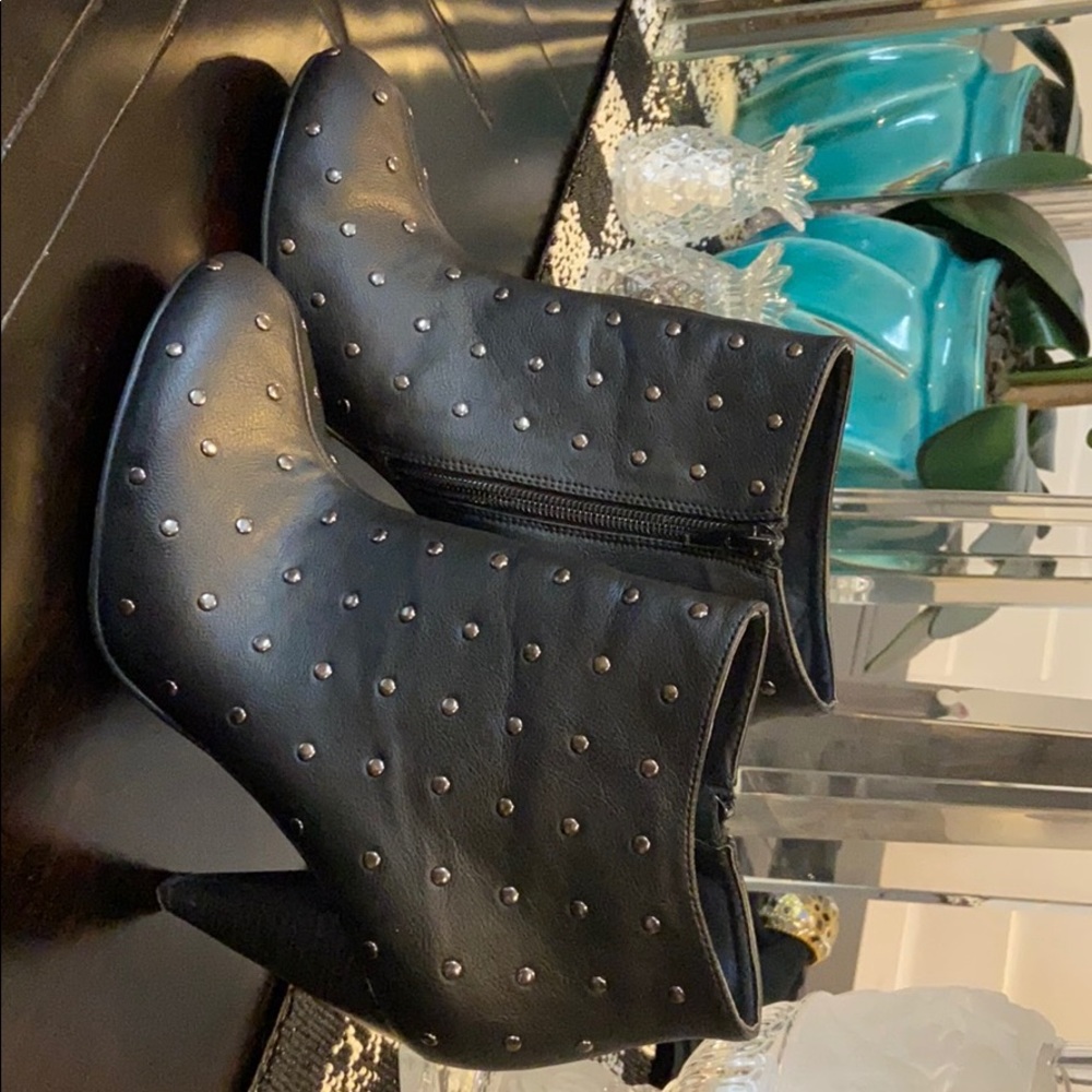 Black studded booties with a 4in heel. Worn twice.